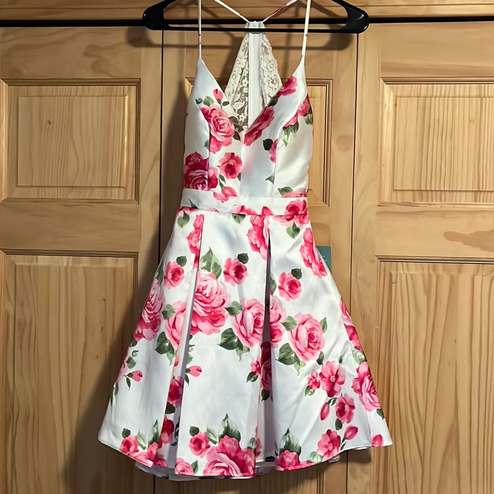 Size 0 B Smart homecoming or party dress. New with tags